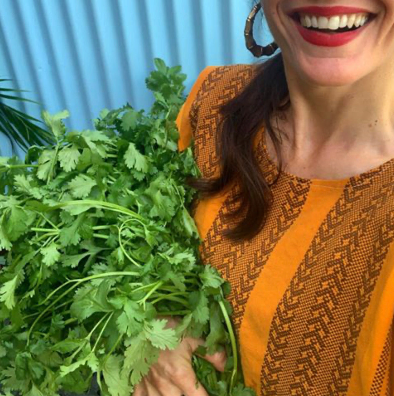 Genna Pyewacket with a bunch of fresh coriander